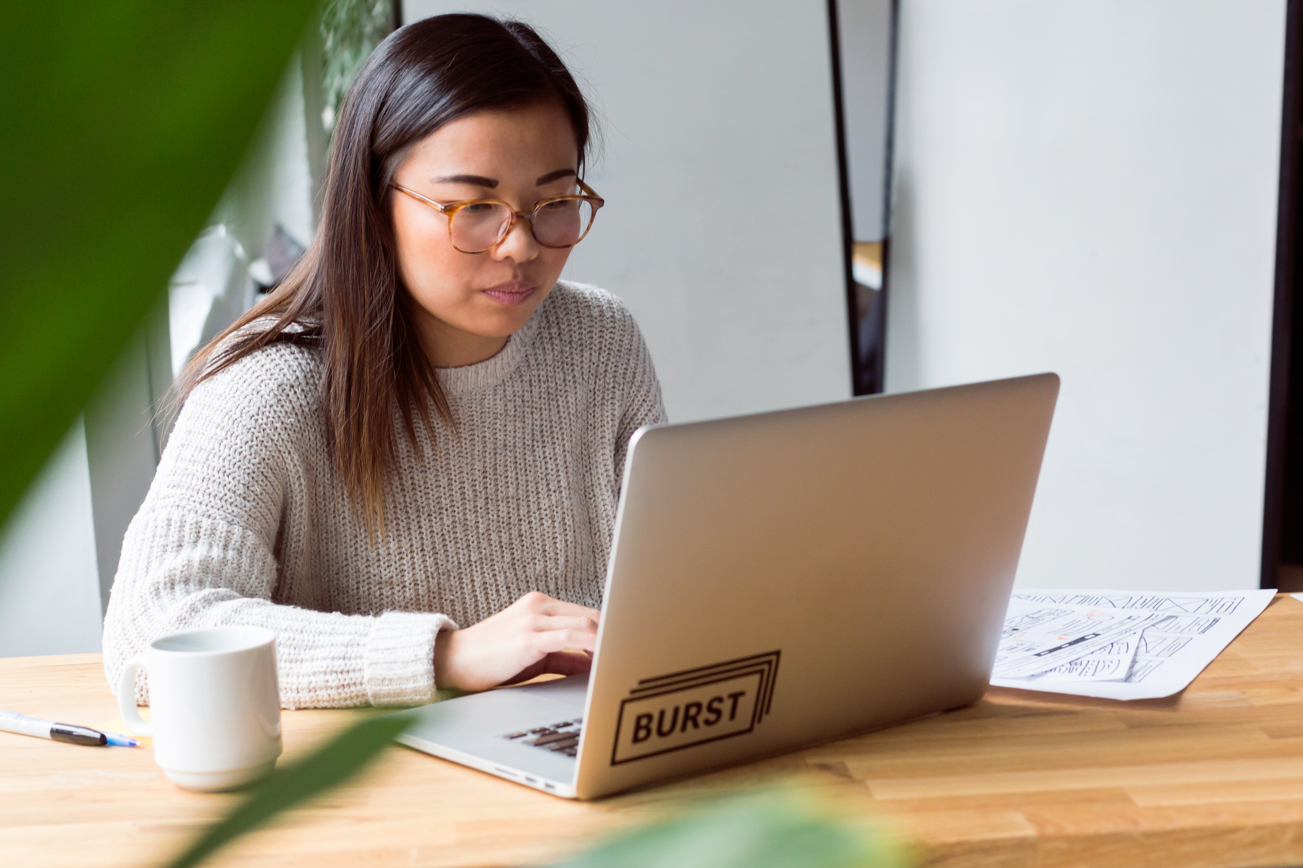 Freelance Designer Working On Laptop Photo