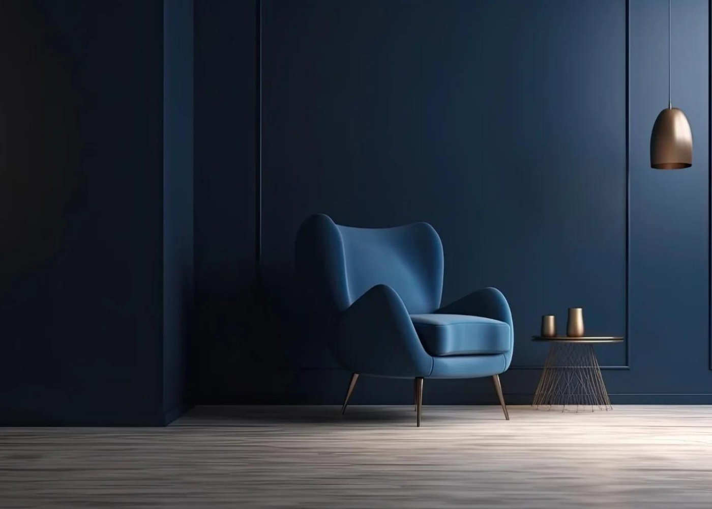 Dark blue armchair against dark blue wall