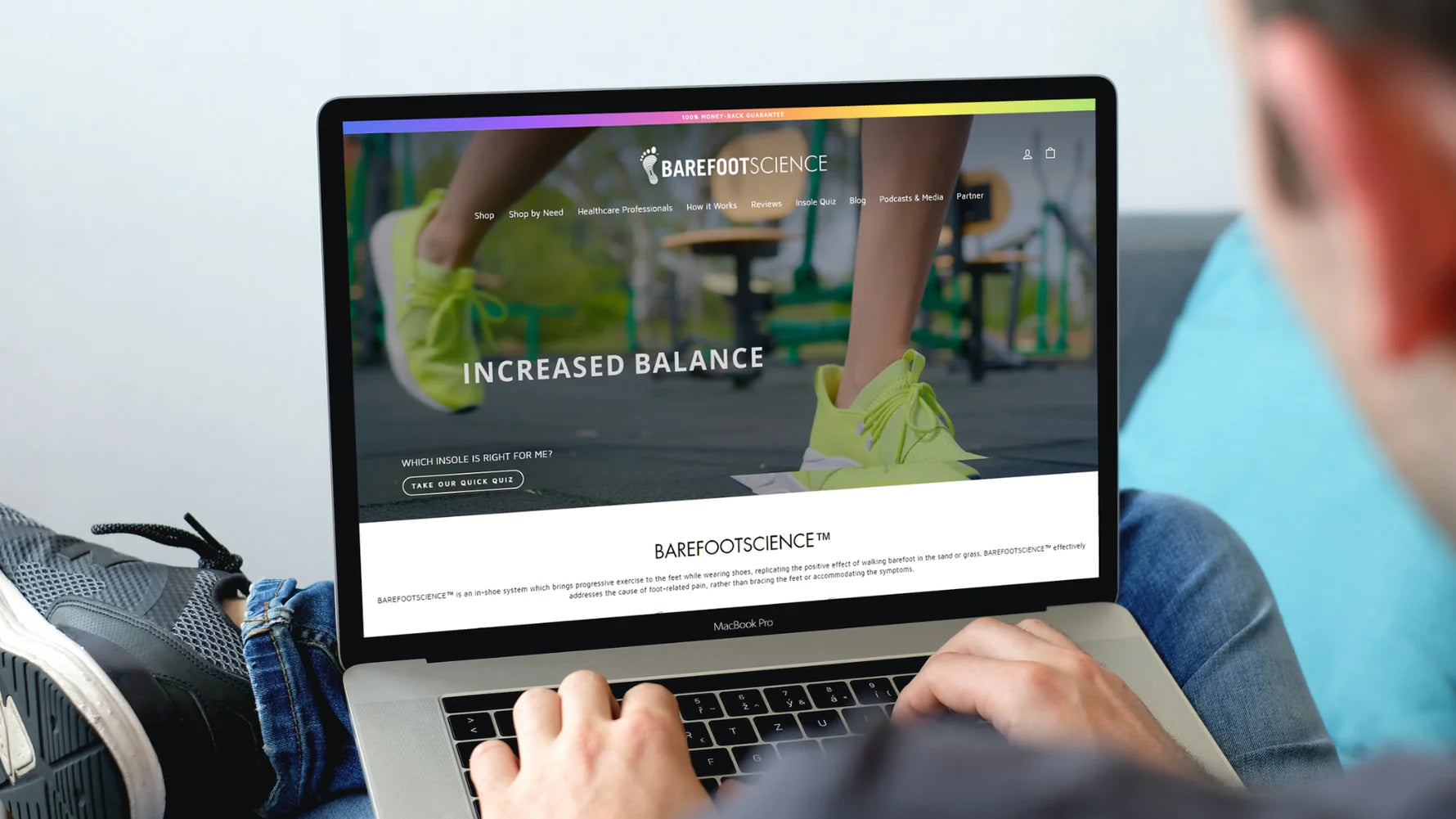 Person browsing Barefoot Science website on laptop