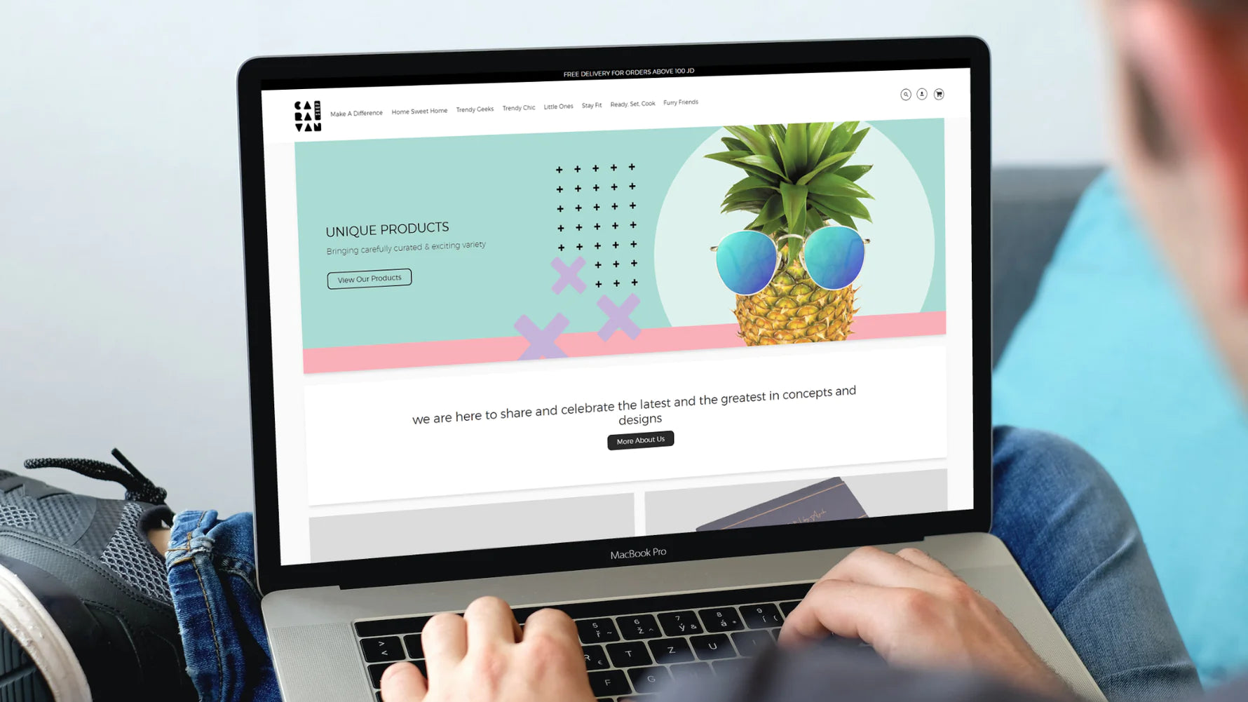 Person browsing Caravan website on laptop