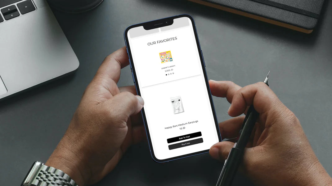 Phone held between two hands