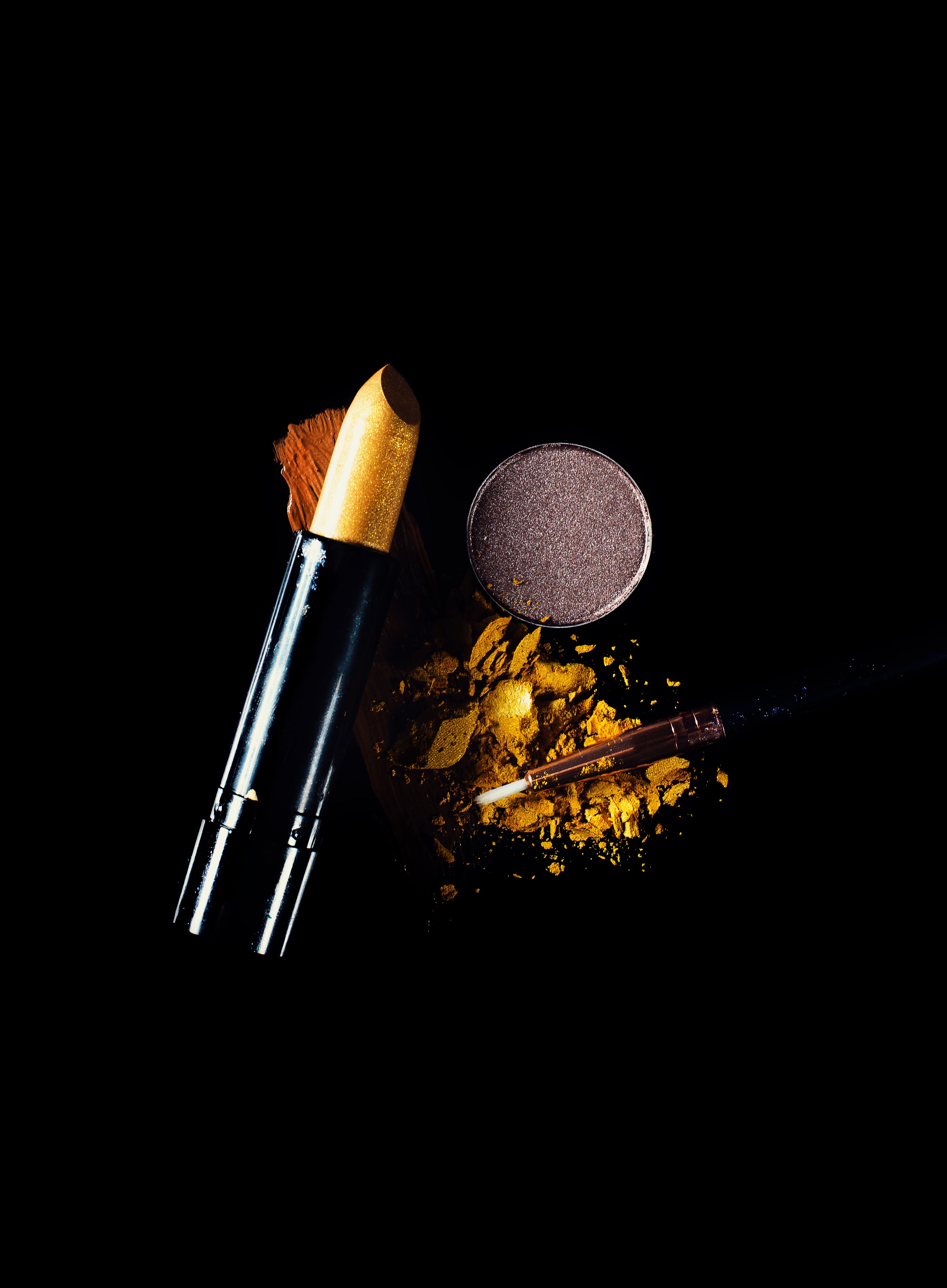 Gold lipstick and makeup swatches