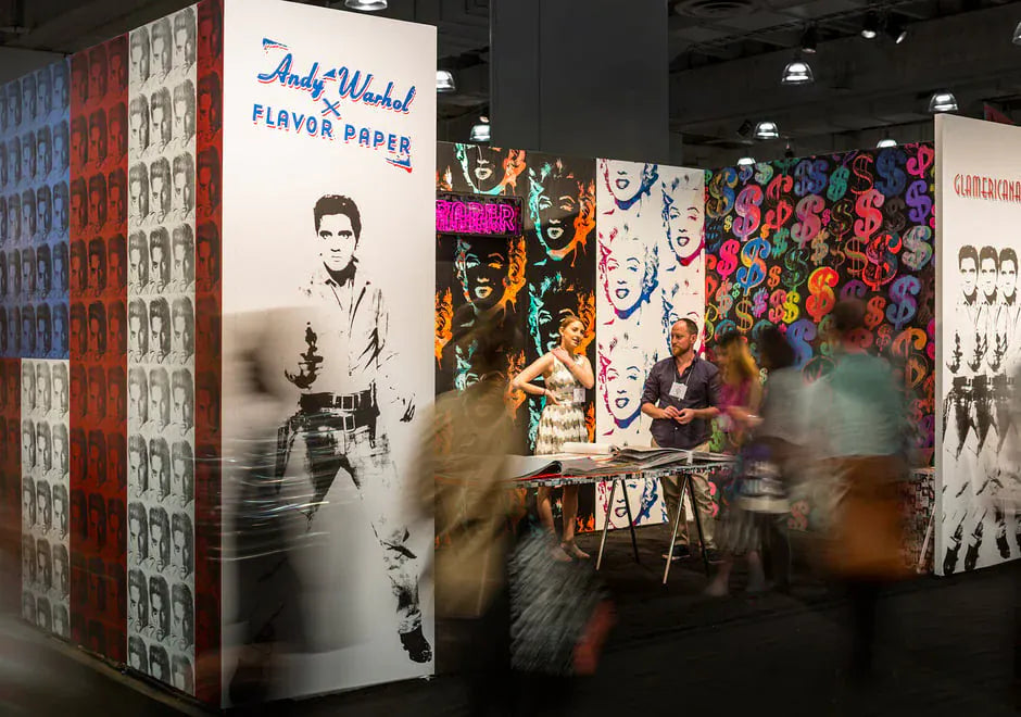 Colorful art displays with people in a gallery setting