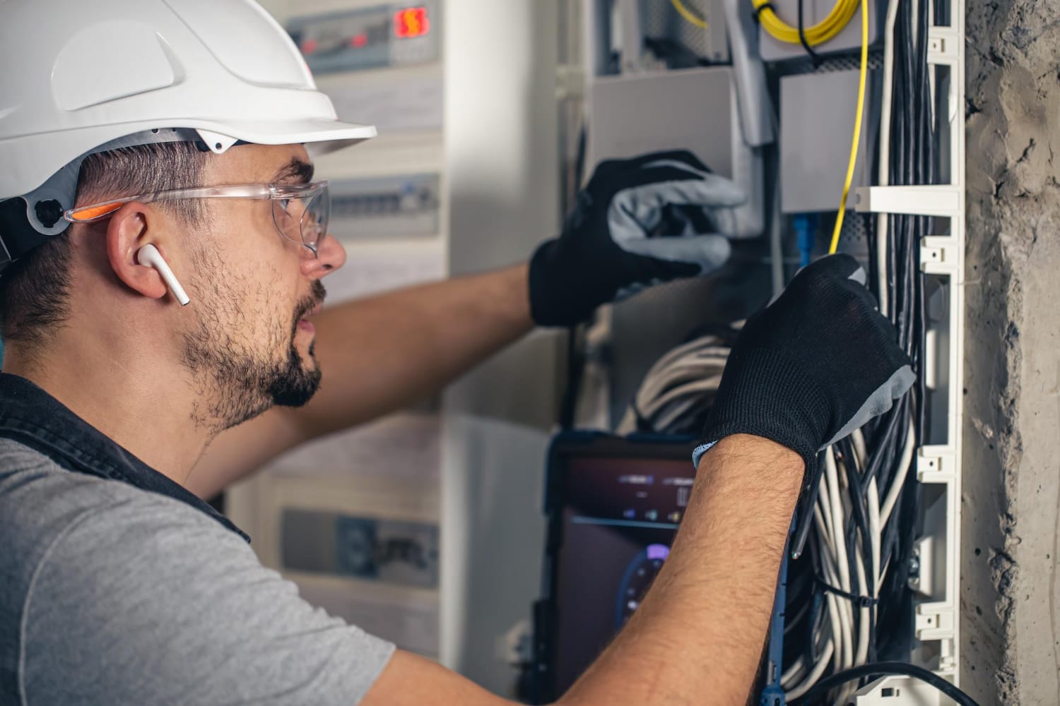 Electrician repairing electrical wiring