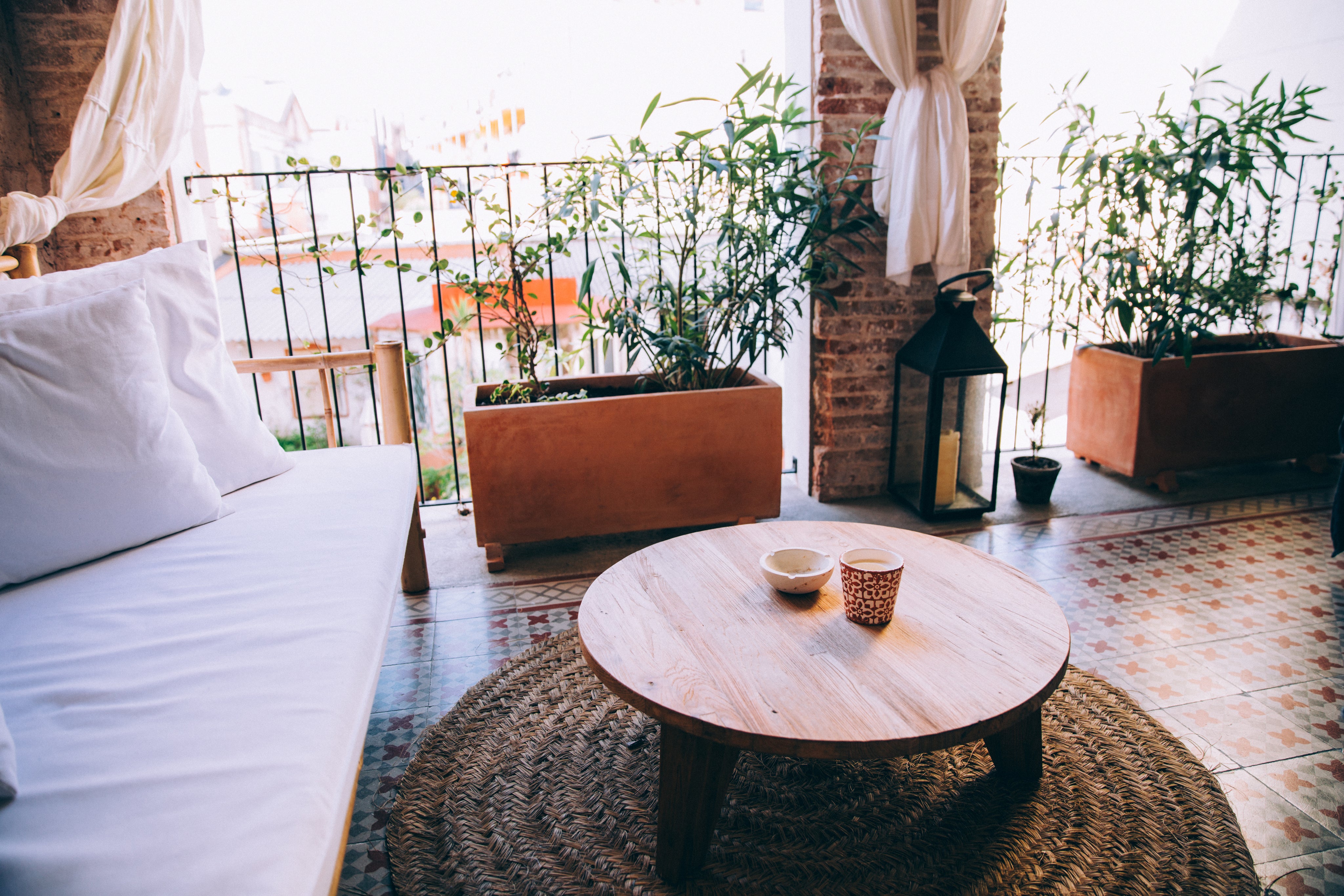 Sofa and coffee table on large balcony