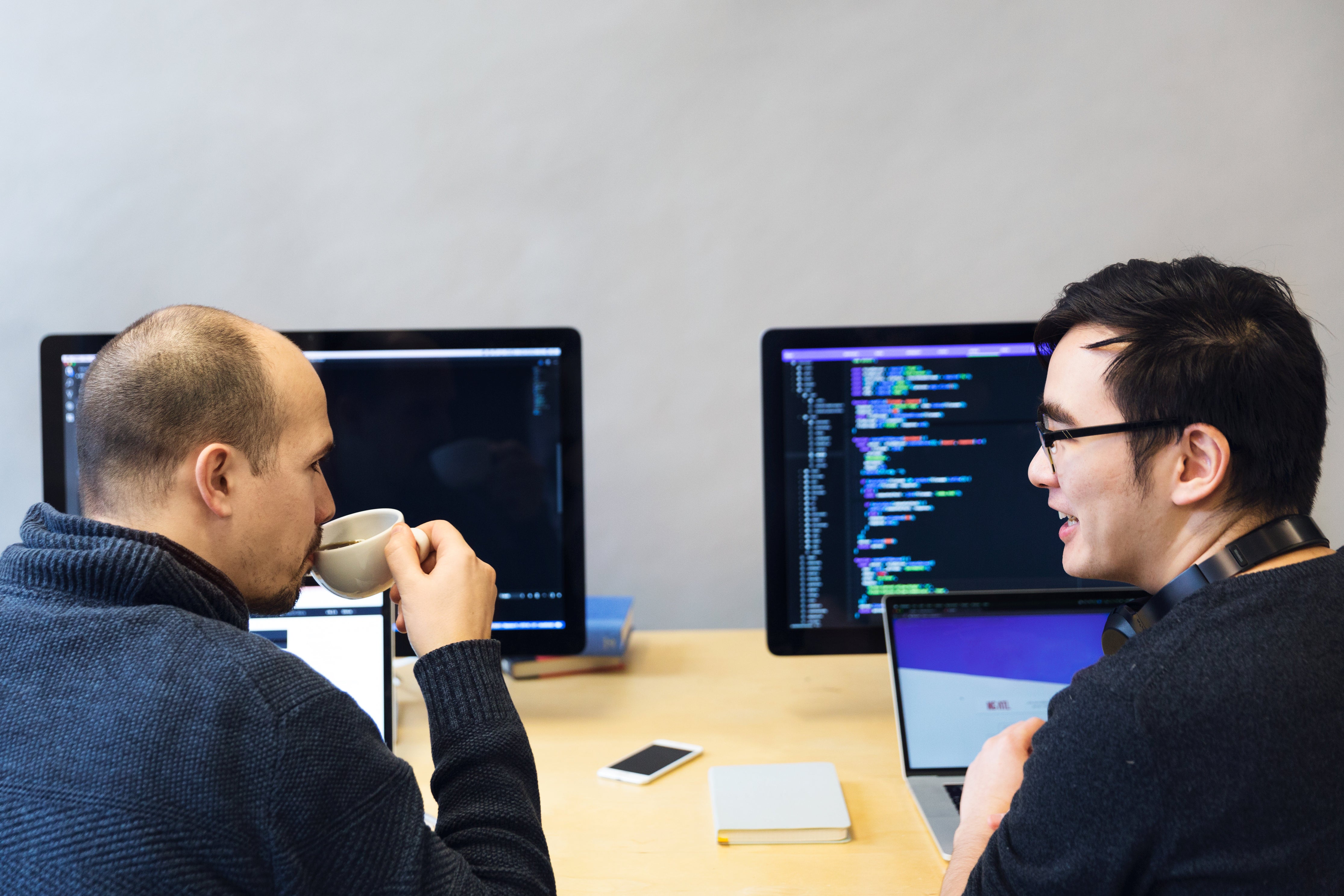 Developers discussing code